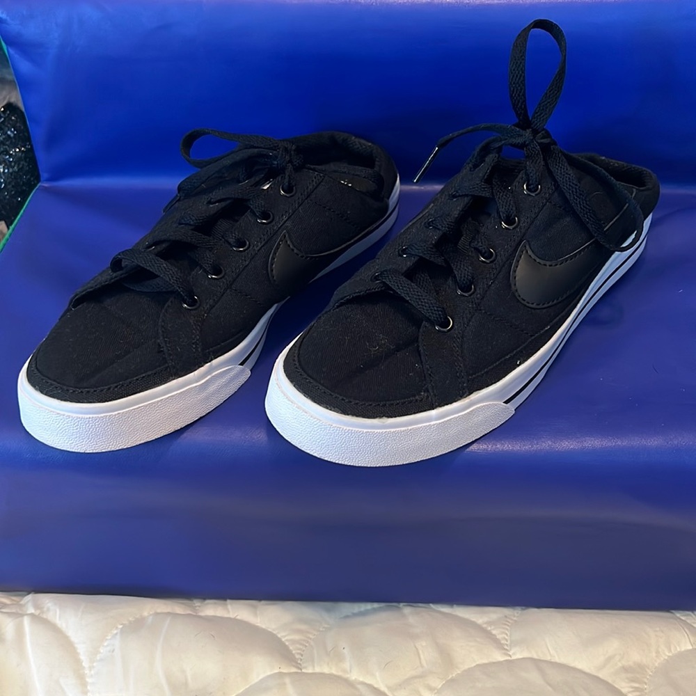 Nike black slip on sneakers